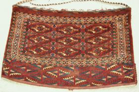 PAIR OF YOMUT CHUVALS 

Very nice PAIR of 19th century Yomut Chuvals. Initial analysis placed the age around 1900 due to the fine condition of the pieces and the inclusion of cotton in the flat weave back. Subsequent analysis puts a more likely dating to the 3rd or 4th quarter of the 19th Century. Analysis shows a possible Atabai atrribution, due primarily to the inclusion of the Erre-gul (secondary gul). It also yields a mid to late 19th century dating due to the 3x3 field design, three arrow points/triangular shapes at the top of the bag (closure points?), and the liberal use of the fine \