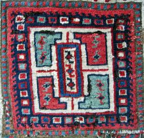  Extremely unusual pair of Caucasian (Moghan?) bags that have had one border cut and then sewn together in the middle. Great graphic design, good wool and saturated colors.