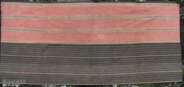 Semi antique, large woman’s sarong from the Stieng/Xtiêng ethic group Vietnam. Over 60 years old, this is woven from all handspun cotton threads. There is a patch, 7cm x 2cm fray on  ...