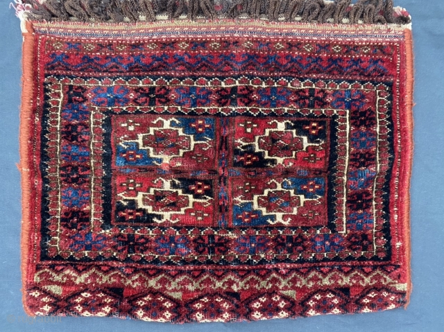 Turkmen bags with shoulder-to-shoulder closure loops have traditionally been attributed to the Goklan, but with this one I’m not too sure. Unusually saturated colors, all natural including a good yellow. Very soft  ...