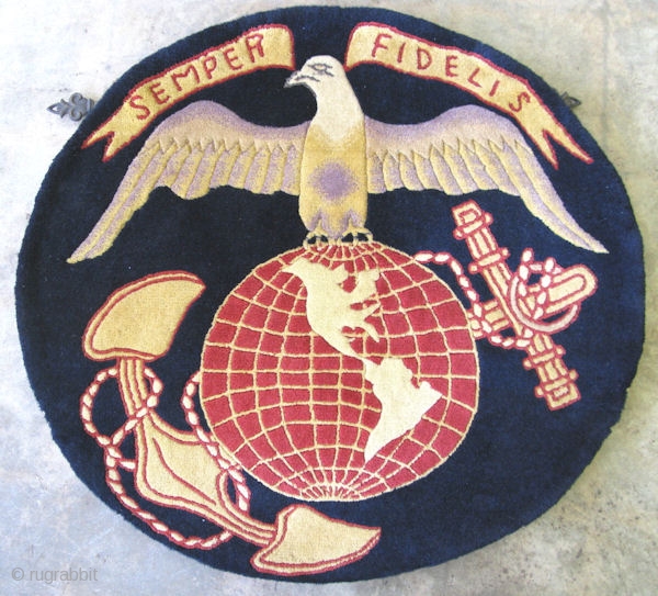 Nichols Chinese rug, hand knotted wool, China, ca. 1930-40's, must have been a special order or limited addition, the Marine Corps emblem on a blue-black field, The eagle, globe, and anchor with ...