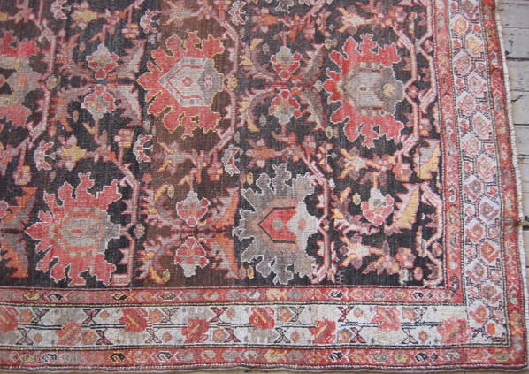Persian Malayer rug, hand knotted wool, Iran, ca.1900, palmetts in Mandarin orange, Imari red, melon, taupe, charcoal, and camel on a chocolate field, ivory border, low even pile with some professional restoration,  ...