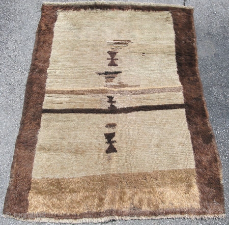 Shaggy primitive Tulu rug, hand knotted with glossy wool or mohair, condition is good with small amounts of reweave, Turkey, 1st half 20thC, beige, with natural tan and brown, size 3 ft. ...