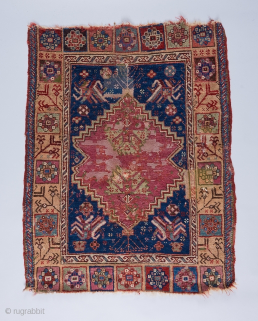 A very interesting Anatolian Yastik acquired recently. 3'2" x 2'6". Old repairs and all.                   