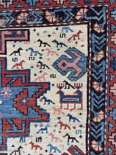 Leshgi - about 3.6 x 4.8 .  Scattered wear/oxidation, minor stain, ends unravelling, enclosure sewn on back where hung. Great graphics and wonderful ivory field.       