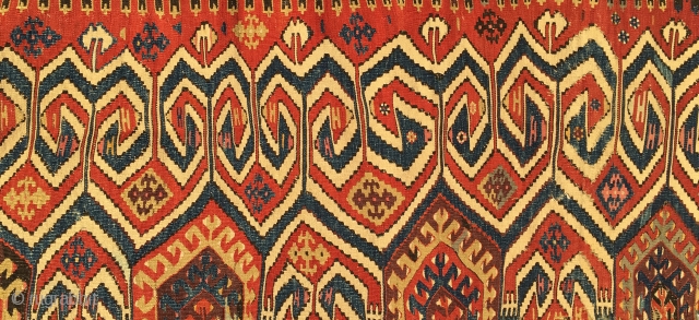 The beauty. Age, graphics, colors, Fantastic pink and aubergine, madder, cochineal, indigo, isparak.....the yellow is incredibly powerful..........Aydinli kilim. West Anatolia. Cm 90x300 ca. Needs restoration, but I would keep it as it  ...