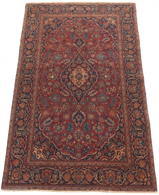 Antique Kashan Carpet, ca. 1930's
4' x 6'9"
Low wool pile on cotton foundation. Very fine hand knotted rug. Field with central complex multicolor medallion with extensions and floral palmette design on ruby red  ...