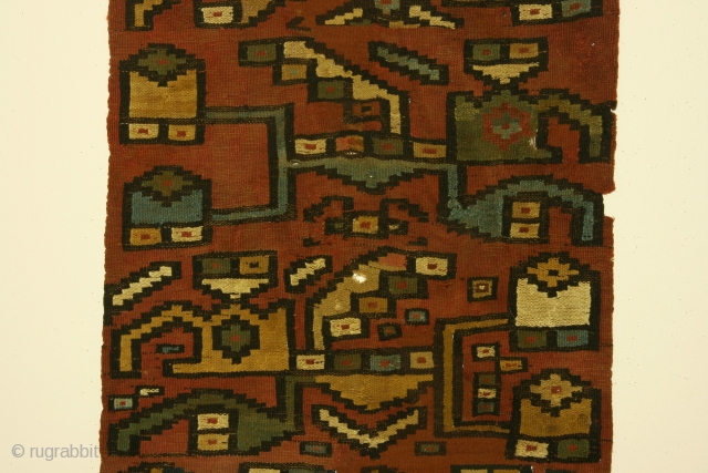 Pre-Columbian panel, complete, Peru, Late Wari culture, circa 900-1000 AD. Dimensions 24 x 36 inches. The structure consists of paired warps and single wefts foundation with supplemental weft patterning. Condition: about 10%  ...