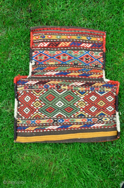 Kurdish salt bag, 20 in. X 18 in. Early 20th C. Wool. Brocaded face, beautiful striped back. Deeply saturated natural dyes. Excellent condition.