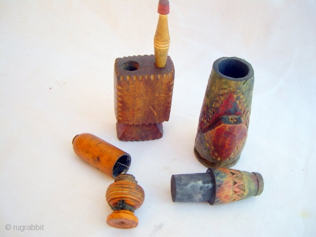 MOROCCAN TUAREG ARTIFACTS which are hand carved, hand painted, wooden pots for the storage of kohl, a cosmetic widely used for eyes. The lids are used to apply the kohl. Similar pieces ...