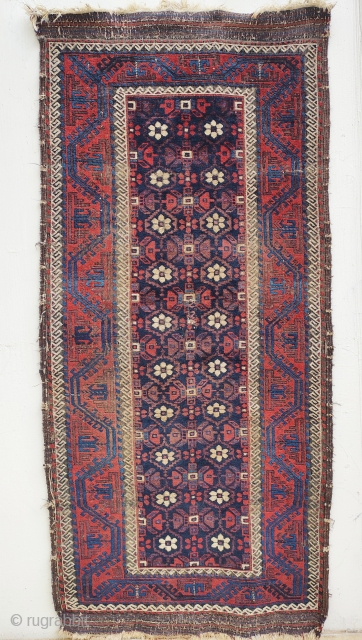 mina khani baluch main rug.
all there , corroded brown, a smalloldpatchinthemiddle.
depressed warps,velvety pile...heavy                    