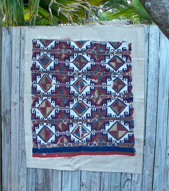 East Anatolian kilim fragment with positive/negative interplay; mounted on linen.                       