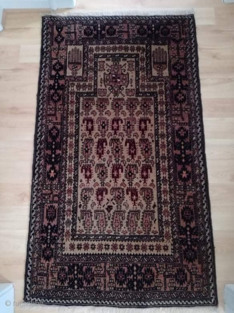 An old Baluch prayer rug in very good shape. 130/80 cm.                      