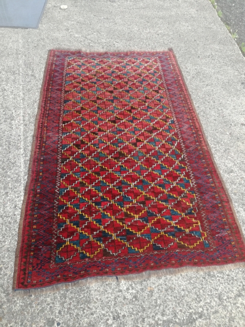 An antique Turkmen rug with 190/115 cm. Good shape with spot worn places.                    