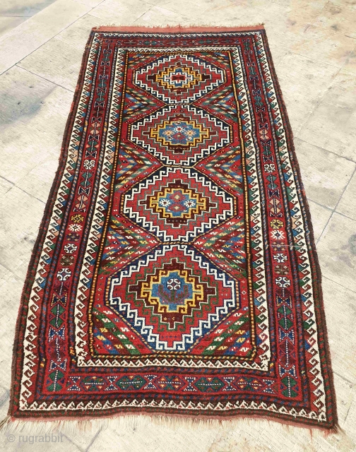 Wool foundation rug from kurds of quchan region , northeast of iran , brilliant shiny colors , glossy wool
 circa 1920 , the rug has a very soft touch
Size 275 * 142  ...