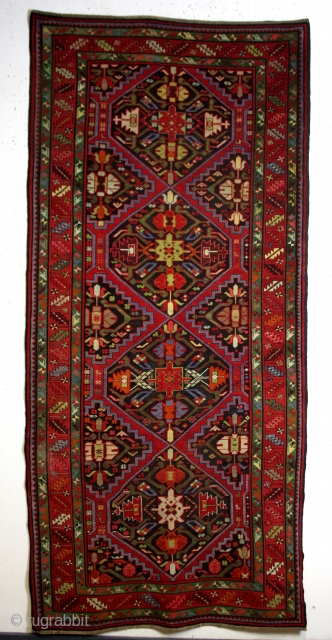 270 x 125 Cm's. 
Karabach, natural colors, nice corroding in the black wool, perfect condition.                  