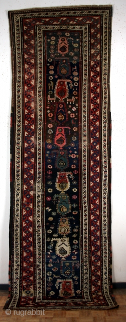An antique Persian carpet Shahsavan (Northwest region, Azerbaijan).
Very nice elegant piece in gallery format. In the rare narrow
The main field marked in blue is made up of twelve vertically
colorful boteh variation, also  ...