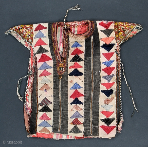 This is a early 20th century central Asian child's dress. It is in excellent condition. A neat piece! It is from the Clute collection.