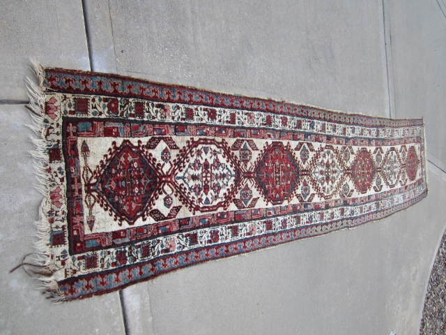 Old Sarab runner 3x13.3. shows some wear and moth damage. Circa 1910's, wool foundation. Not sure if all dyes are natural. Missing outer guard borders on both ends.     