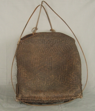 India, Himalayas: Fine and rare old rattan “tali” basket with a contracted mouth from the Idu Mishmi ethnic group of Arunachal Pradesh, India. In India they are primarily animist but in China  ...