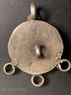 Two antique Indian charms from Tamil Nadu. The larger one is an Araimudi, in the shape of fig leaf and was by worn by young village girls to protect their “modesty”, the  ...