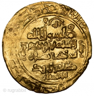 ISLAMIC, GREAT SELJUK EMPIRE . Sultan Tughril I Beg Muhammad, AH 429-455 / AD 1038-1063. AV Dinar  (Gold Coin ) Dated AH 452 = AD 1060 . Weight: 3.34 grams.
  