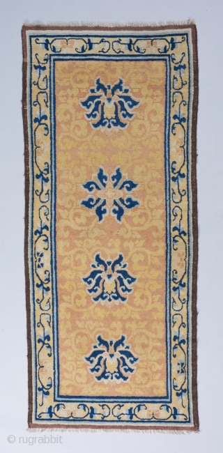 Late 18th/early 19th century Ningxia runner reduced in length as many of these are. One whole end border rewoven and the outer guard border on the other end rewoven. The rest is  ...