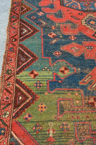 Kurdish rug. 7'3" x 4'2". Areas of wear and some glue on the back.                   