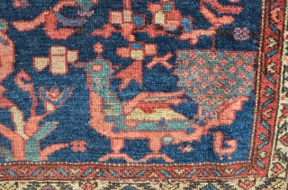 Rug with roosters. 4'8" x 3'10".                           