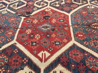 Aydin Cine kilim. Size is cm 150x360 ca. Second half 19th century. Professionally mounted on black linen. Gorgeous colors. Fantastic deep madder red, great cochineal pink, indigo blue, light yellow,, etc. Very  ...