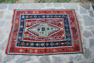 Sivas kilim. Cm 100x143. Second half 19th century. A small jewel! Wonderful color combination. Please note also the deep madder orange, it's simply great! Good condition. See more pics here:
http://www.facebook.com/media/set/?set=a.10151084874054258.493384.358259864257&type=1