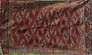 Yomut small rug. Cm 105x180 ca. Early 20th c. Great condition, full pile. Dyrnak gul pattern, Yomut eagles in the elems. A date? or an inscription? in the in the top left  ...