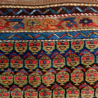Cheerful Kurdish rug, 307x121cm, 19th century, 9 saturated, happy colours, brown corroded otherwise very good pile, glossy wool. Two old repairs, one tear at the outer border. 385 bothe faces are smiling  ...