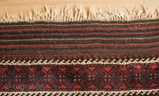 Khorassan Baluch rug, 4th quarter of the 19th century.  Saturated blues and rich brooding ember red.  Kilim ends in tact.  Linked hexagon border with "S" figures in the center  ...