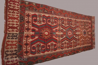 Anatolian kilim (big price reduction) with three large central medallions, 5 x 14 feet, circa 1800-1825 with considerable reweaving of black yarn in the borders and some reweaving in the field as  ...