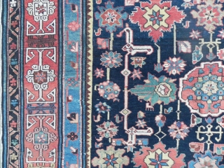 Antique Caucasian Afshan Kuba (Blossom) Rug, 5.10 x 7.9 ft (183x240 cm), navy blue field framed by a red kufic border, good medium pile throughout, dates from 3rd quarter 19th century.  