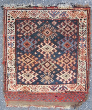 Two Kurdish bag faces, early 20th C.,each with good colors and a soft supple weave. Size-- one with small hole 27" x 26", the other 28" x 25"... Shipping extra