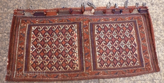 Superb large Persian Arab camel bag, 19th C. The saddlebag posted next to it is part of the "set". Beautiful terracotta and turquoise blue colour, shinny wool, soumak front and plain weave ...