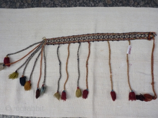 Very finely and tightly woven Qashqai Kashkuli horse band. Nice colours. The tassels are original to the band (some missing). Stock: 2605. Size 62x4 cms