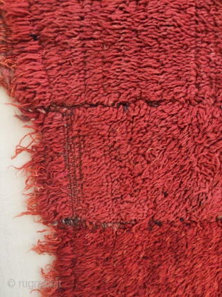 -master red-
19th c. warp-faced back long pile weaving on a tsukdruk loom. originaly a tibetan monk cloak.
made of 16 narrow strips, fantastic red most probably from madder roots. best of type, very  ...