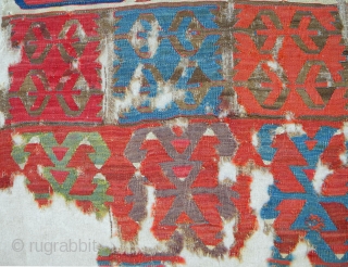 Early Hotamis kilim fragment, 152 x 90 cms. Great colours and drawing. Professionally mounted on linen.                 