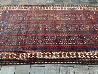 Old Kazak or Karabagh rug with 243/134 cm. Perfect condition with full pile.                    