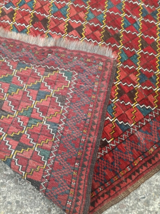 An antique Turkmen rug with 190/115 cm. Good shape with spot worn places.                    