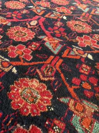 A very old uncommon Iran Hamadan rug. Very light and thin. On wool frings and cotton wefts. Even wear with about three or four repairs. 

230/115 cm.      
