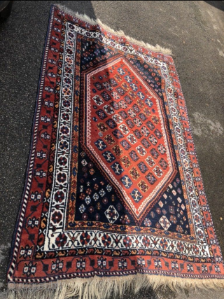 An old Gashgai rug in good shape. 240/150 cm.                        