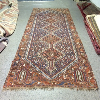 An old Gashgai carpet with 380/140 cm. Good shape for its age, some signs of use.                 