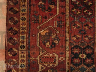 Beshir Ersari Main Carpet, 6'7 x 13'10. Circa 1875. Nearly complete, and scarce so, with Herati and Khotan main borders and the five-medallion Herati field pattern. Very restorable, with the usual scattered ...