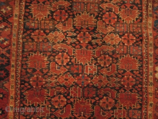 Beshir Ersari Main Carpet, 6'7 x 13'10. Circa 1875. Nearly complete, and scarce so, with Herati and Khotan main borders and the five-medallion Herati field pattern. Very restorable, with the usual scattered ...