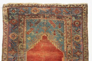 Antique Turkish Ladik prayer rug. Reweaves, faded patches, latex. You name it. A sampler of bad repair. Possibly 50% original. Most of the center is original and is at least early 19th ...