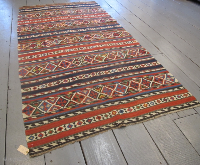 Fine 19th century Caucasian Kilim with very happy colours, 2.85m x 1.49m (9'3" x 4'11").                  